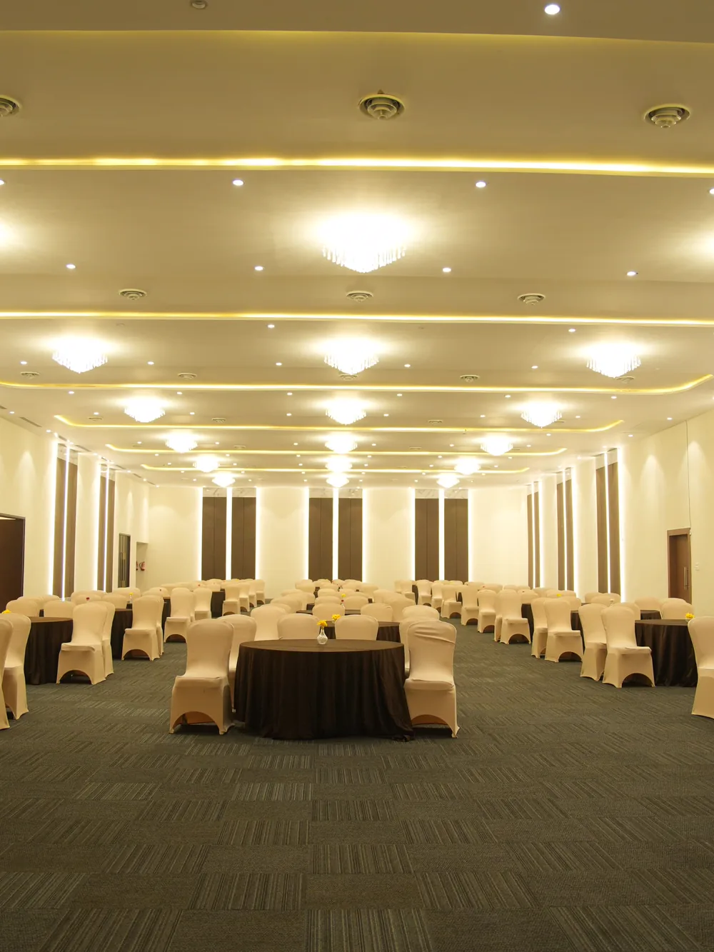 A warmly lit hall for a smaller function