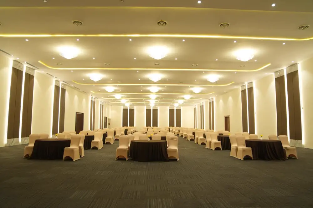 A warmly lit hall for a smaller function