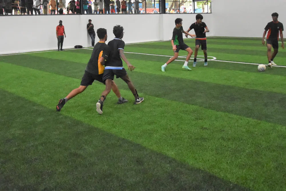 A five-a-side football game on the turf