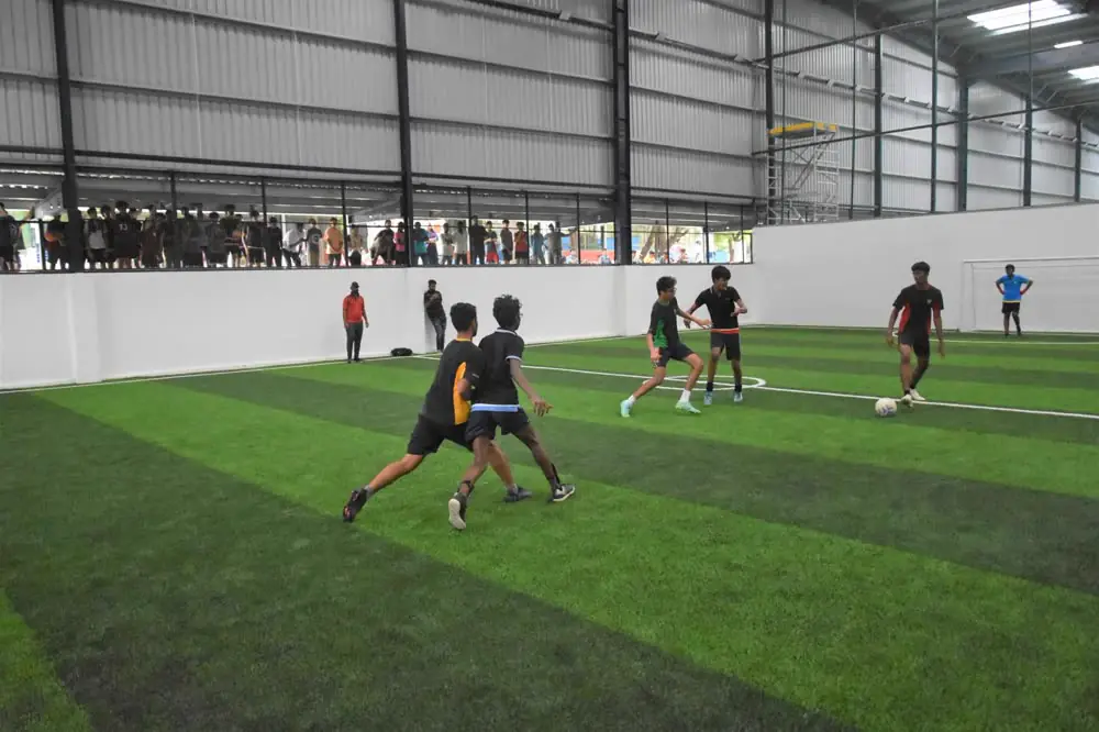 A five-a-side football game on the turf